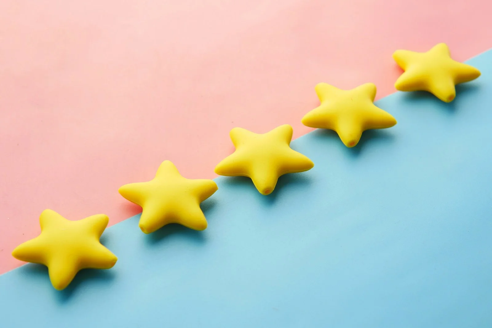 Five yellow stars representing customer reviews and ratings that influence brand trust