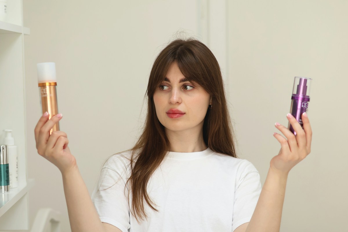Shopper comparing two similar products before choosing one