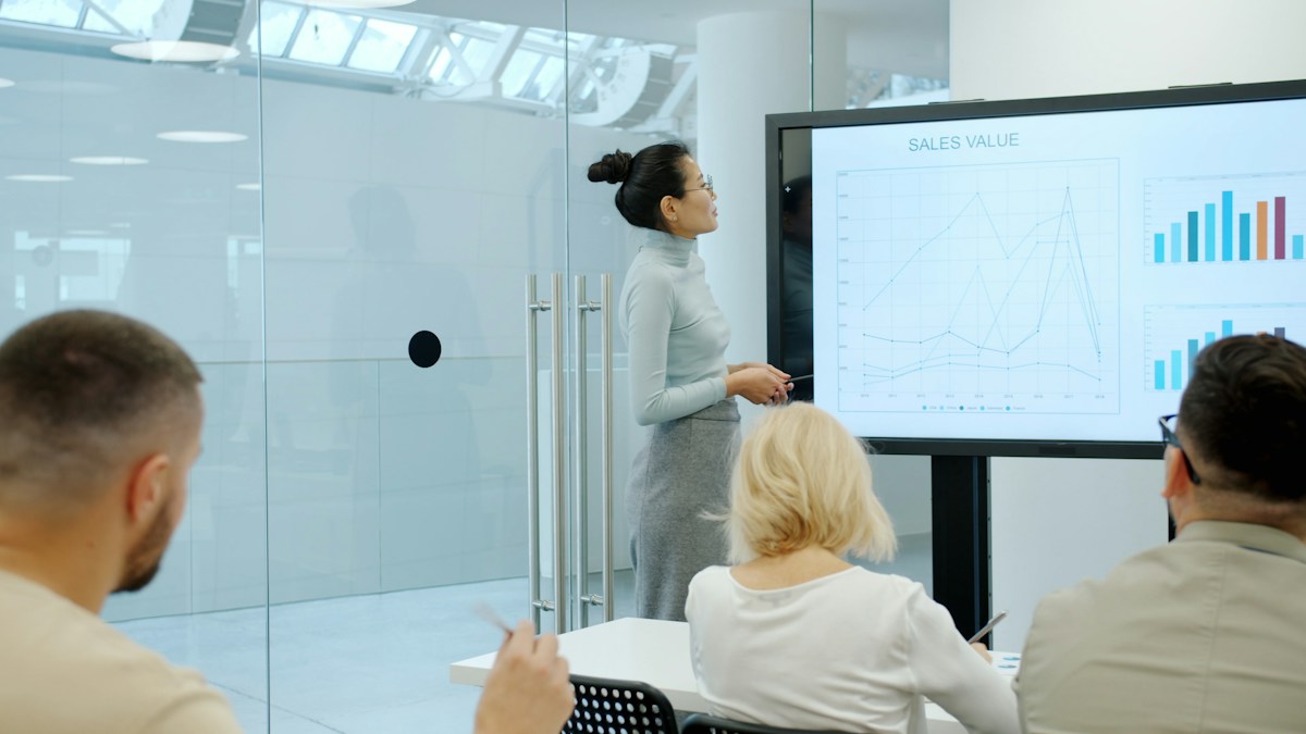 Marketing team reviewing consumer research on how price affects perceived quality