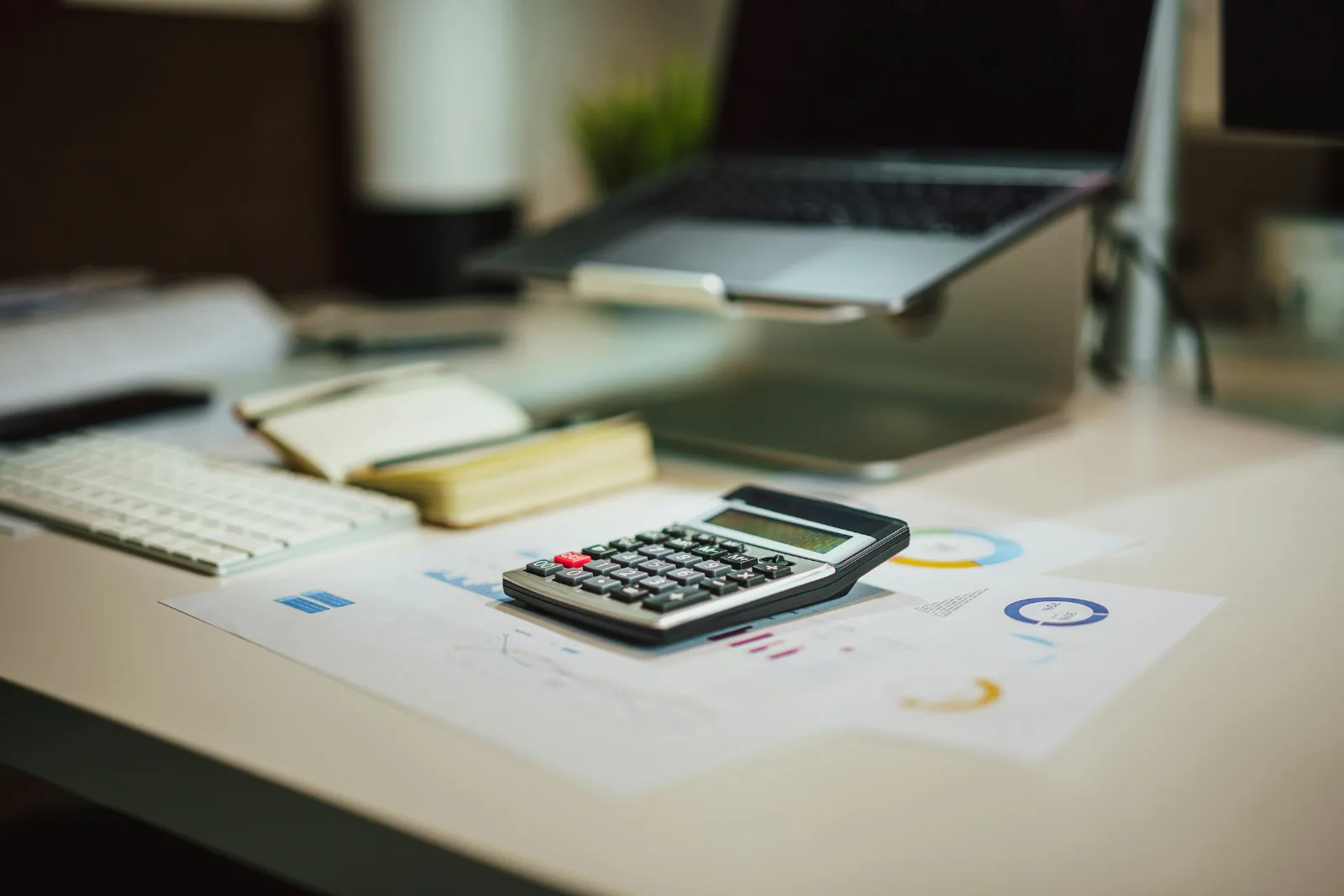 Calculator on financial reports used to work out compensation costs